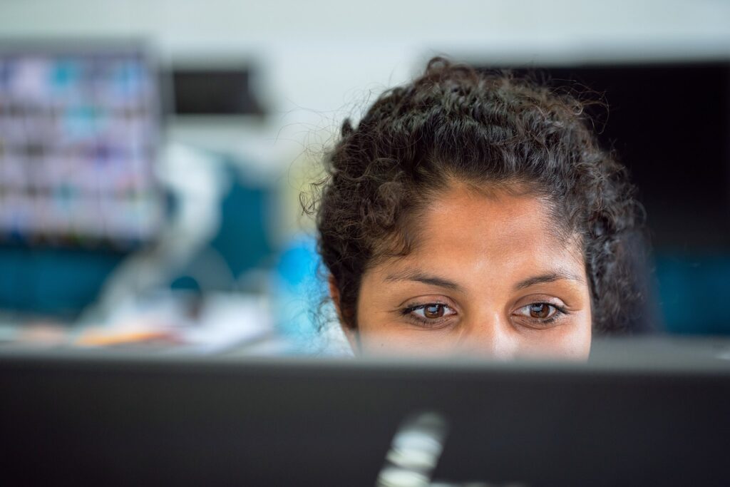 woman watching a monitor